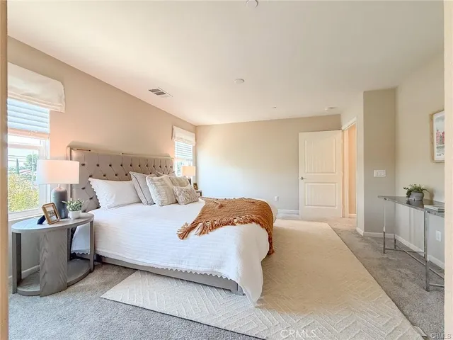 a view of a room with a large window