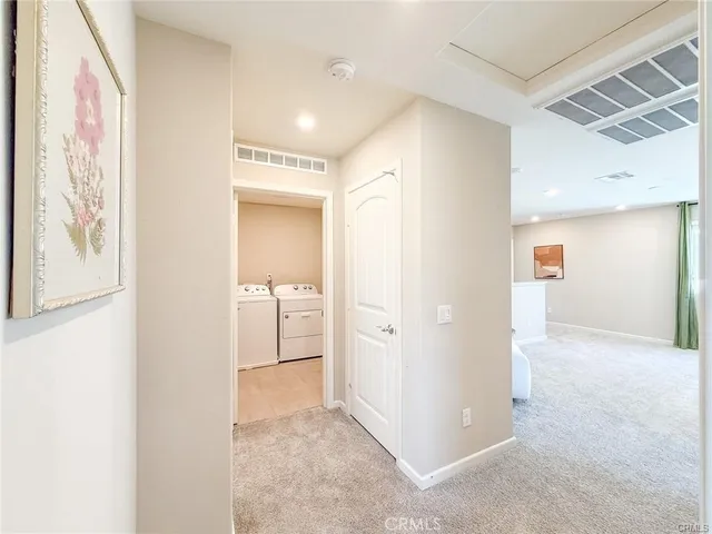 a view of a swimming pool with a lounge chairs