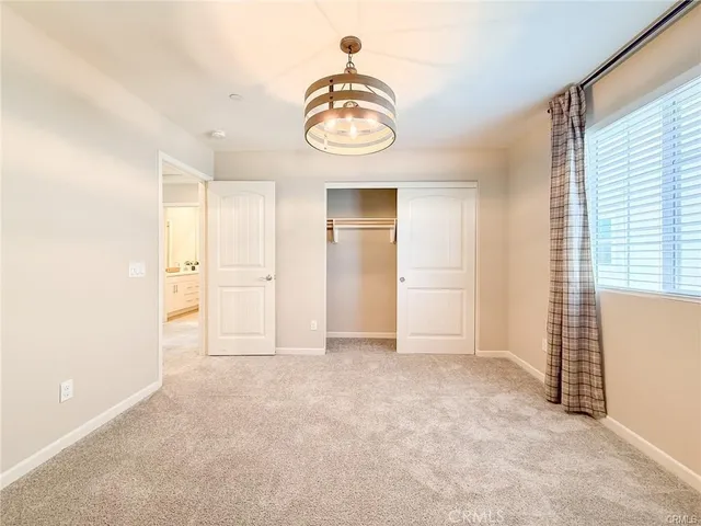 a bathroom with a shower and a mirror