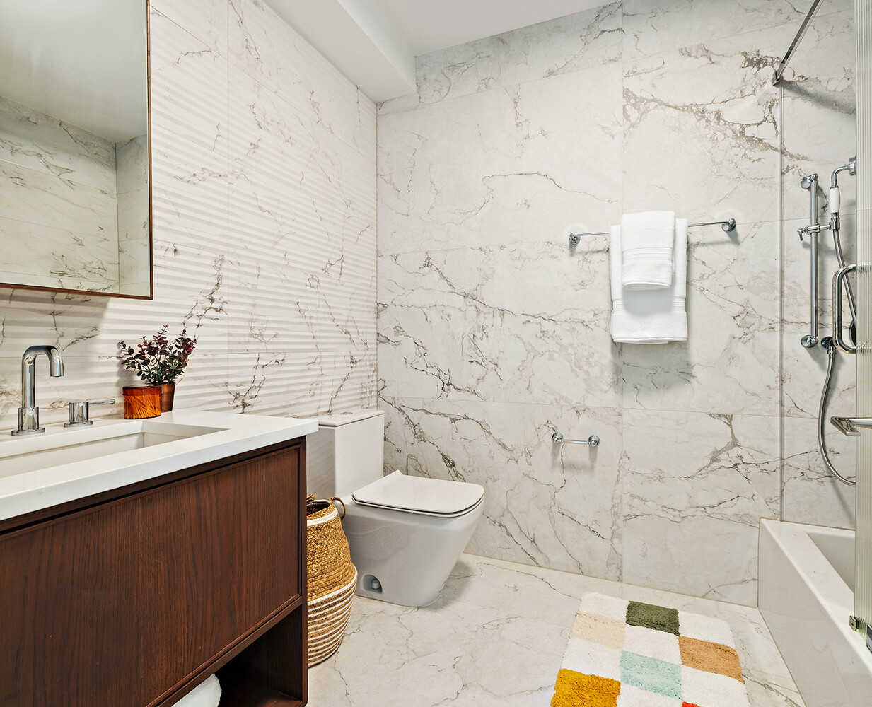 436 West 20th Street Manhattan, NY 10011 - Photo 12 of 24 a bathroom with a sink toilet and shower