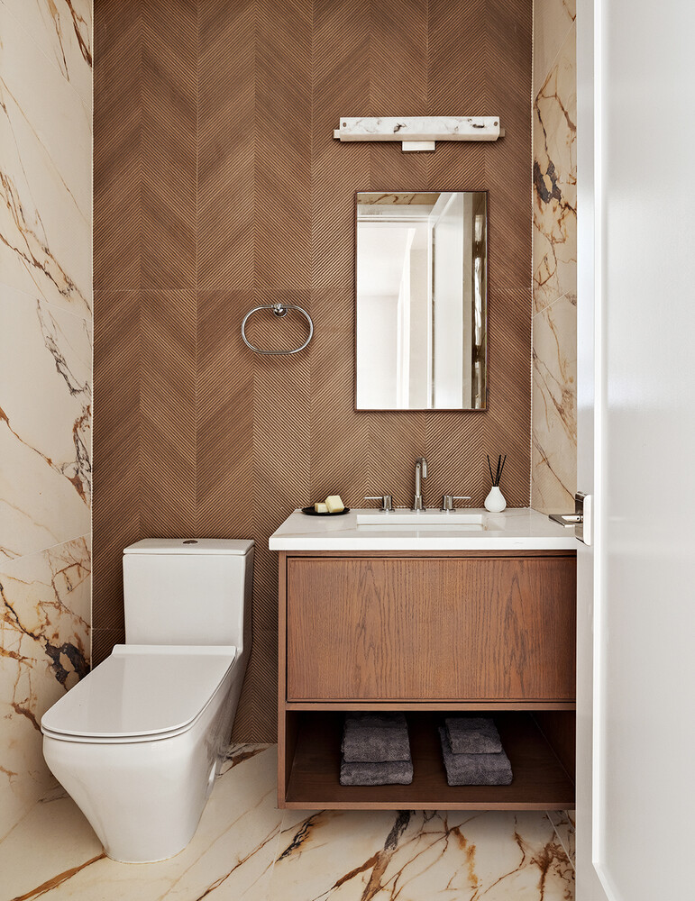 436 West 20th Street Manhattan, NY 10011 - Photo 22 of 24 a bathroom with a sink a toilet and mirror