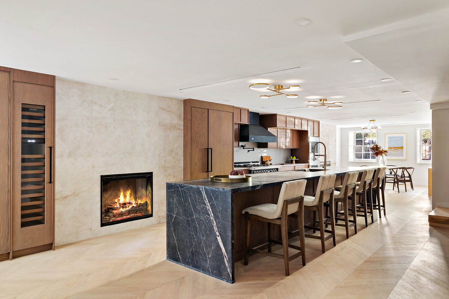 436 West 20th Street Manhattan, NY 10011 - Photo 4 of 24 a view of a dining room with furniture and a fireplace