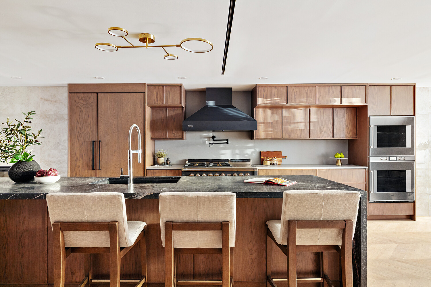 436 West 20th Street Manhattan, NY 10011 - Photo 5 of 24 a kitchen with a table chairs stove and microwave