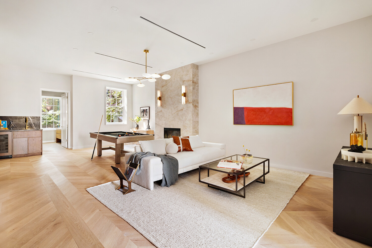 436 West 20th Street Manhattan, NY 10011 - Photo 8 of 24 a living room with furniture and a flat screen tv