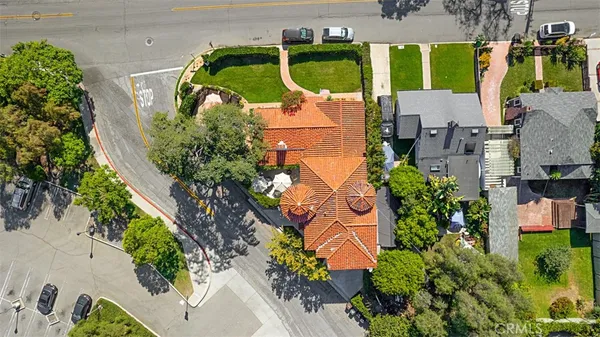 an aerial view of a house with a swimming pool