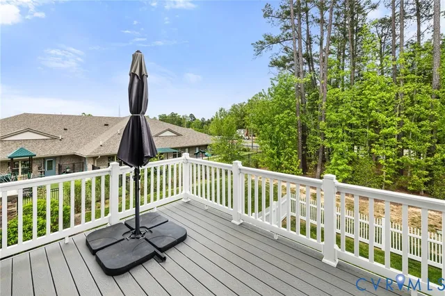 a kitchen with stainless steel appliances granite countertop a sink a stove and a microwave