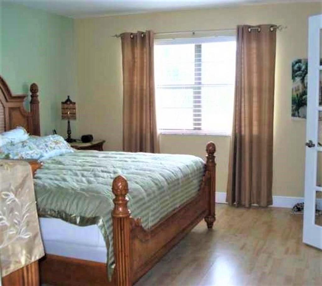 9273 Southwest 8th Street, Unit 209 Boca Raton, FL 33428 - Photo 11 of 32 Master bedroom