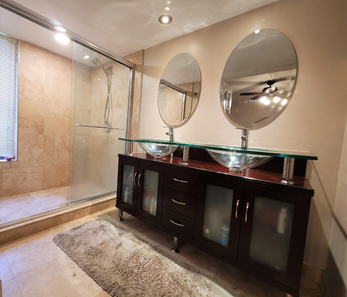 9273 Southwest 8th Street, Unit 209 Boca Raton, FL 33428 - Photo 16 of 32 Master Bath Vanity & Shower