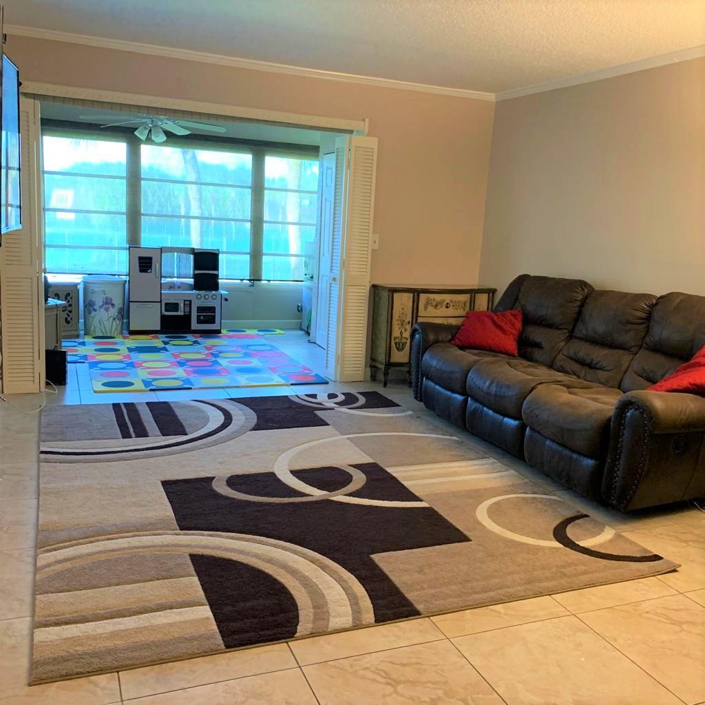9273 Southwest 8th Street, Unit 209 Boca Raton, FL 33428 - Photo 9 of 32 Sitting Room