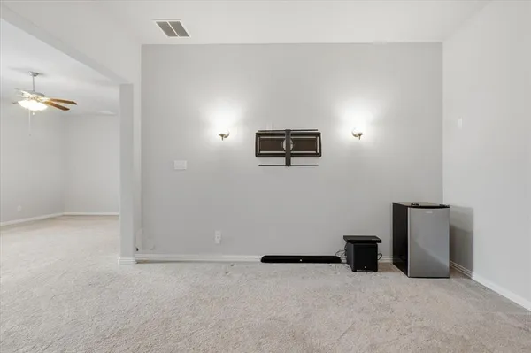 an empty room with projector