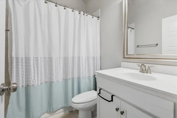a bathroom with a sink and a toilet