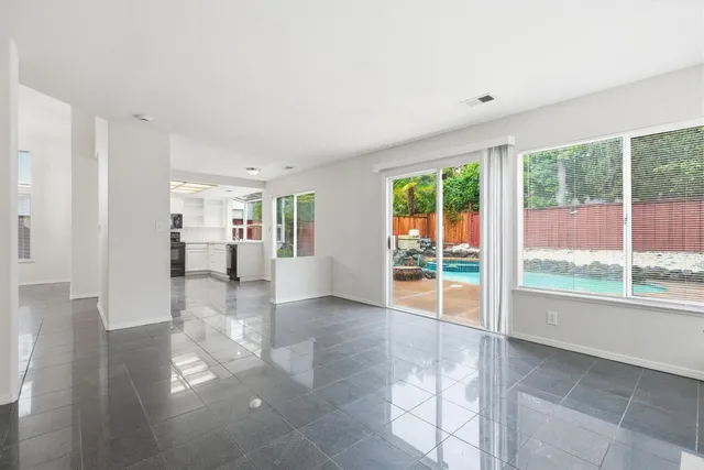 a view of livingroom with furniture wooden floor and window