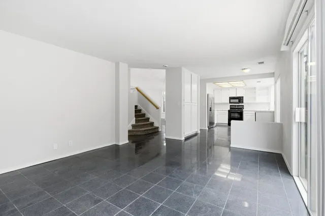 a view of an entryway with stairs