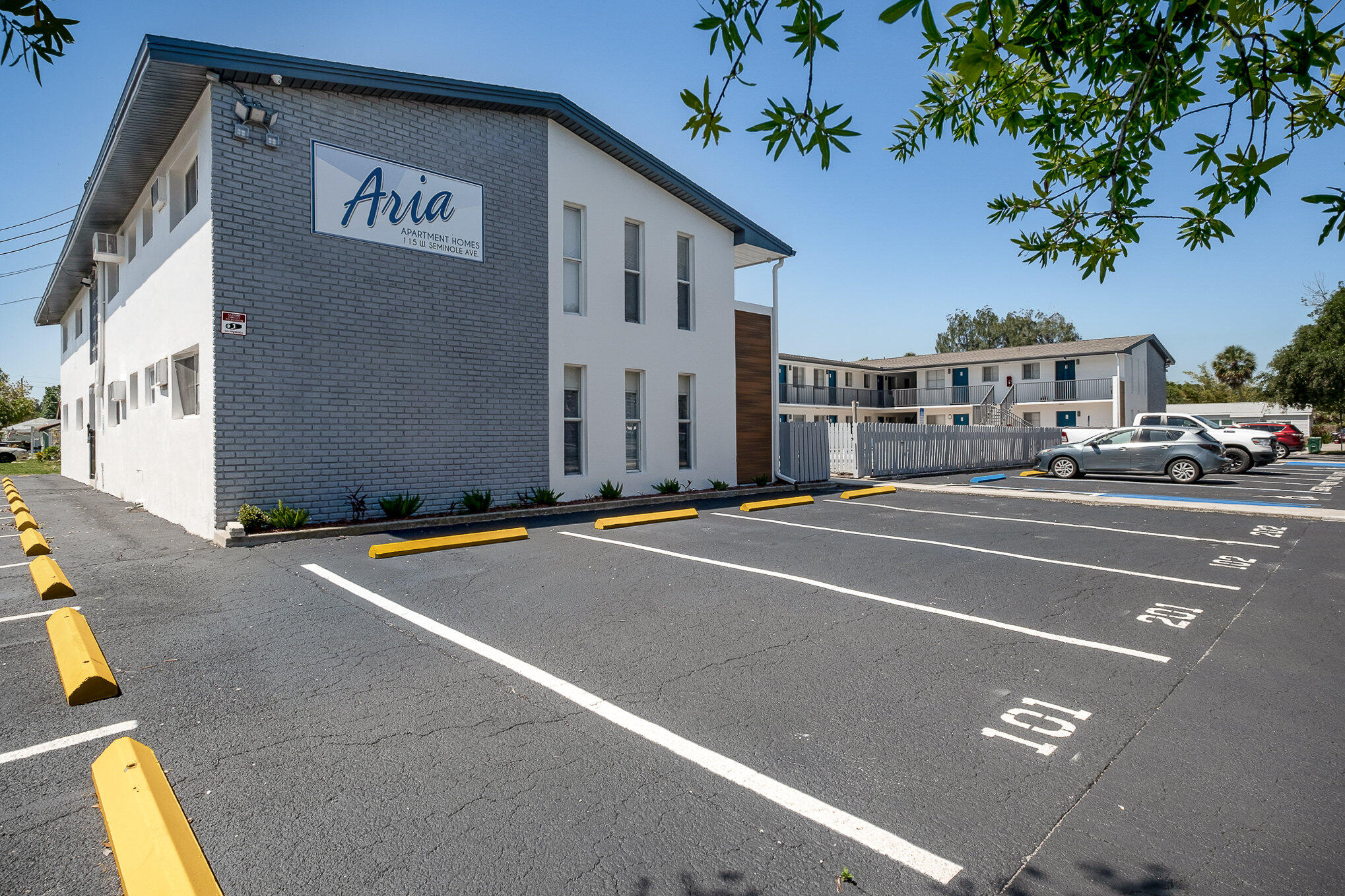 115 Seminole Avenue West, Unit 209 Melbourne, FL 32901 - Photo 1 of 23 a view of a building with a street