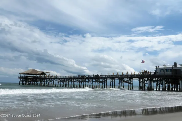 a view of a chairs and table in a yard