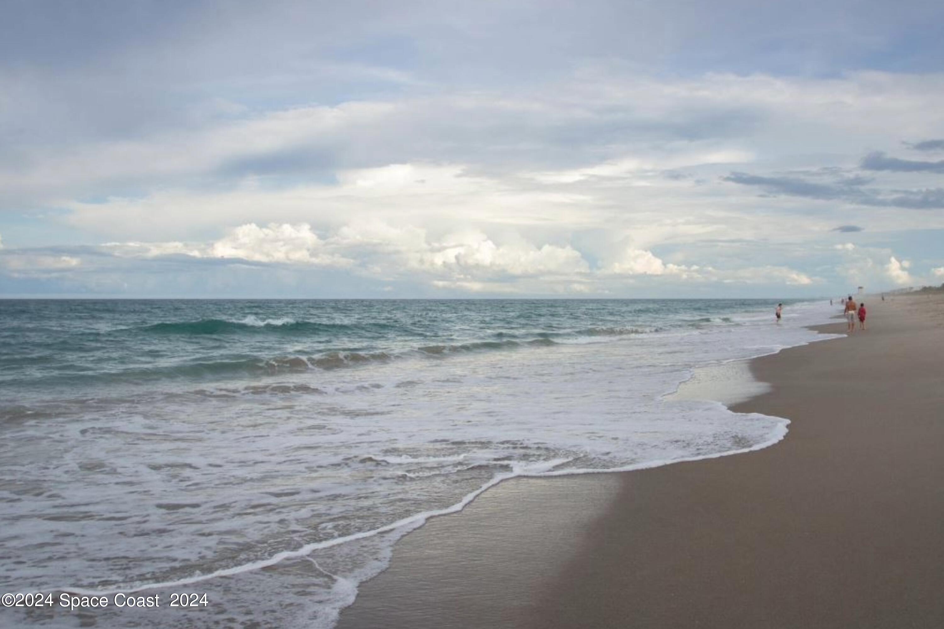 115 Seminole Avenue West, Unit 209 Melbourne, FL 32901 - Photo 19 of 23 a view of beach and ocean