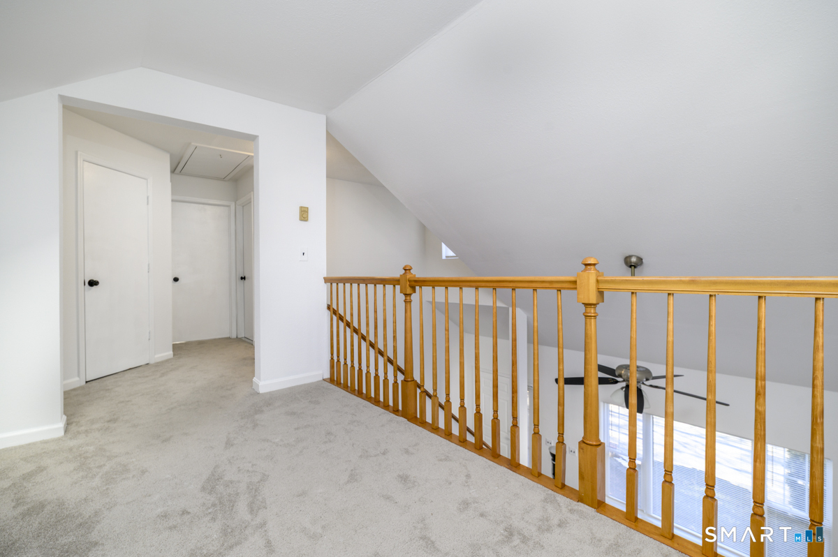 905 Oronoke Road, Unit 13 Waterbury, CT 06708 - Photo 22 of 28 a view of a porch with wooden floor