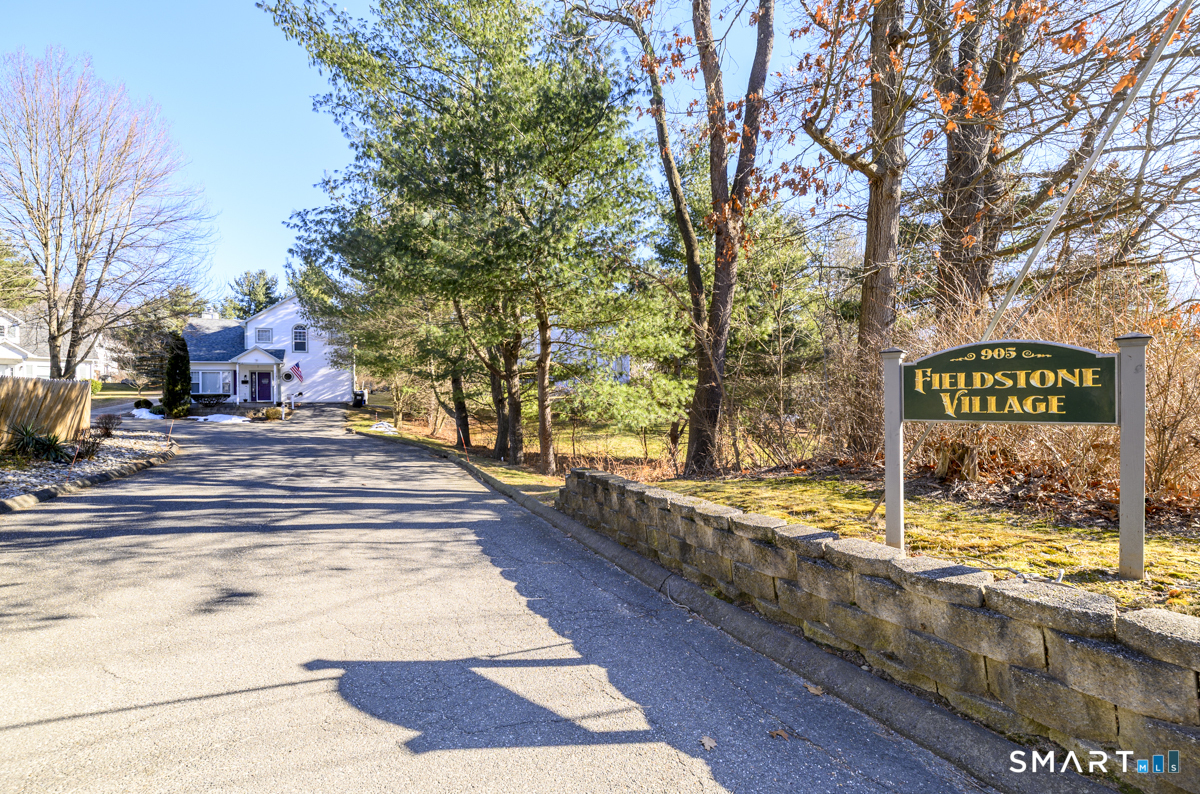 905 Oronoke Road, Unit 13 Waterbury, CT 06708 - Photo 7 of 28 a sign board with a yard