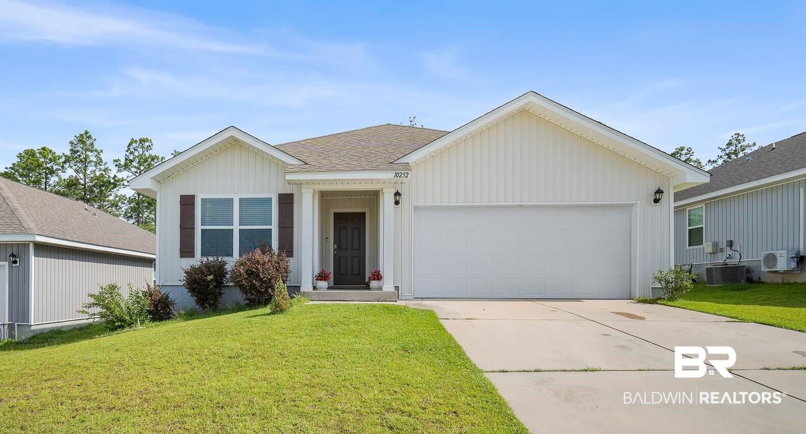 10232 Brodick Loop Spanish Fort, AL 36527 - Photo 1 of 29 Ranch-style house with a garage, a front lawn, central AC, and concrete driveway