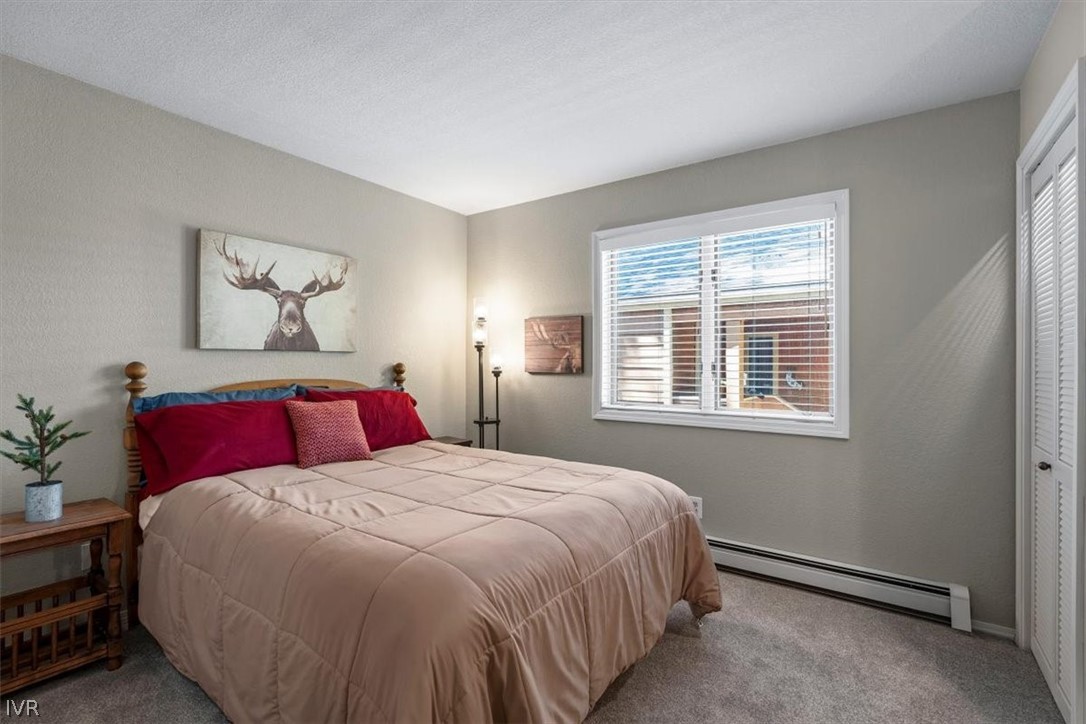 947 Incline Way, Unit 172 Incline Village, NV 89451 - Photo 19 of 30 a bedroom with a bed and a window