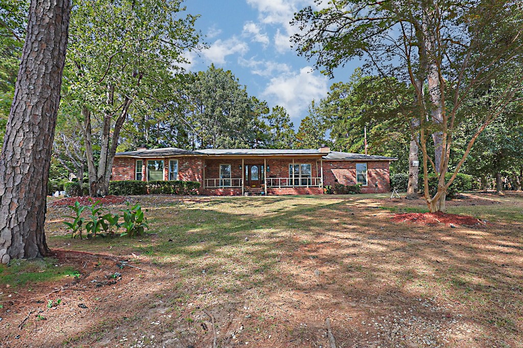 994 Ga Highway Fortson, GA 31808 - Photo 2 of 46 a view of a house with backyard and sitting area