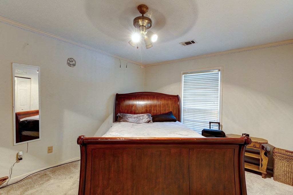 994 Ga Highway Fortson, GA 31808 - Photo 21 of 46 a room with furniture and flat screen tv