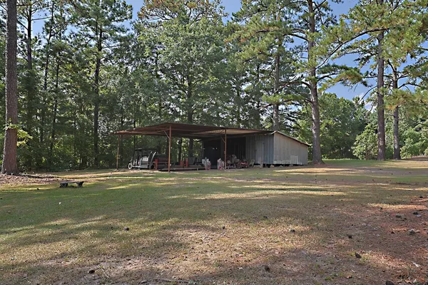 a view of a lake with a big yard