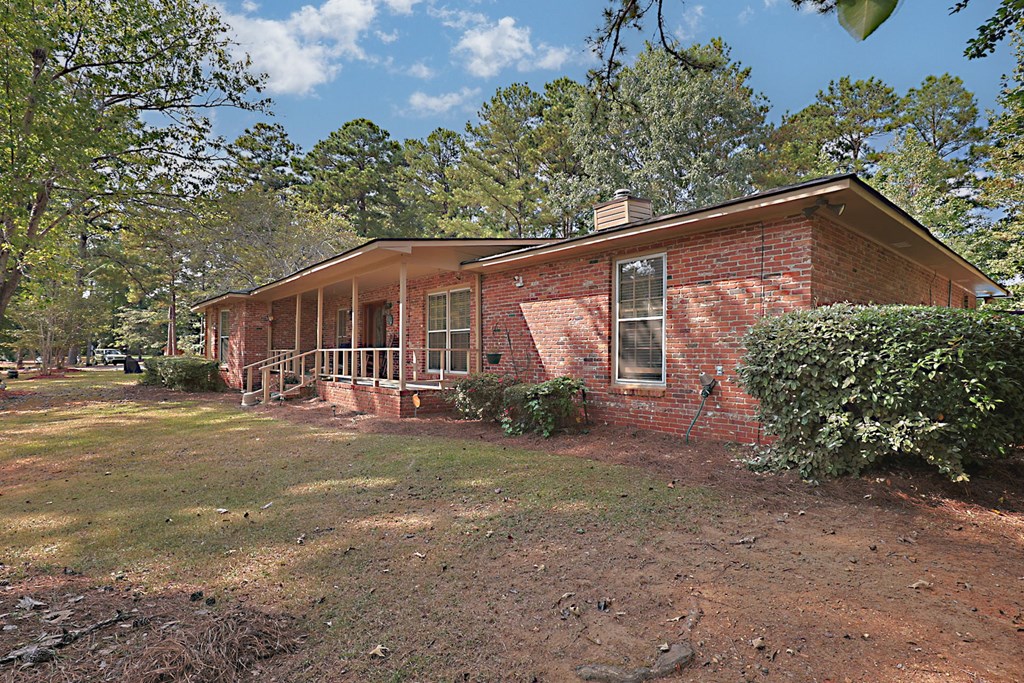 994 Ga Highway Fortson, GA 31808 - Photo 33 of 46 a view of a house with a yard