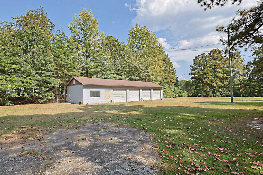 994 Ga Highway Fortson, GA 31808 - Photo 37 of 46 a big yard with large trees
