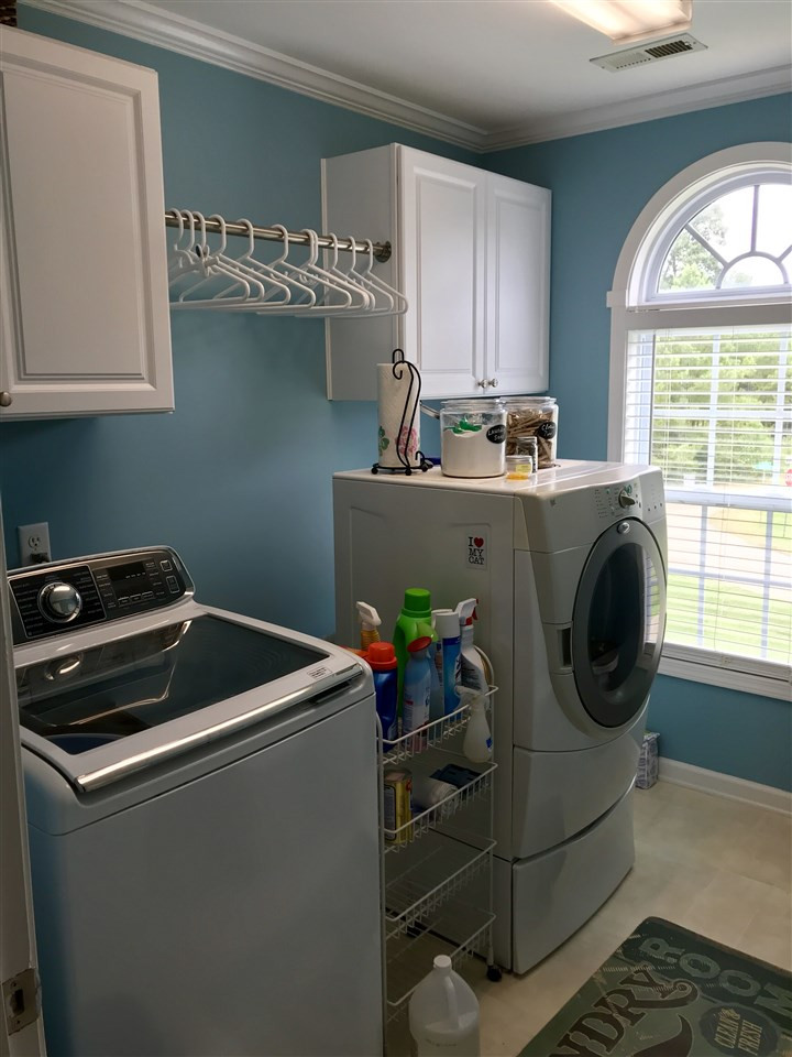 1401 Red Brick Road Garner, NC 27529 - Photo 17 of 21 Large walk in Laundry with cabinet storage