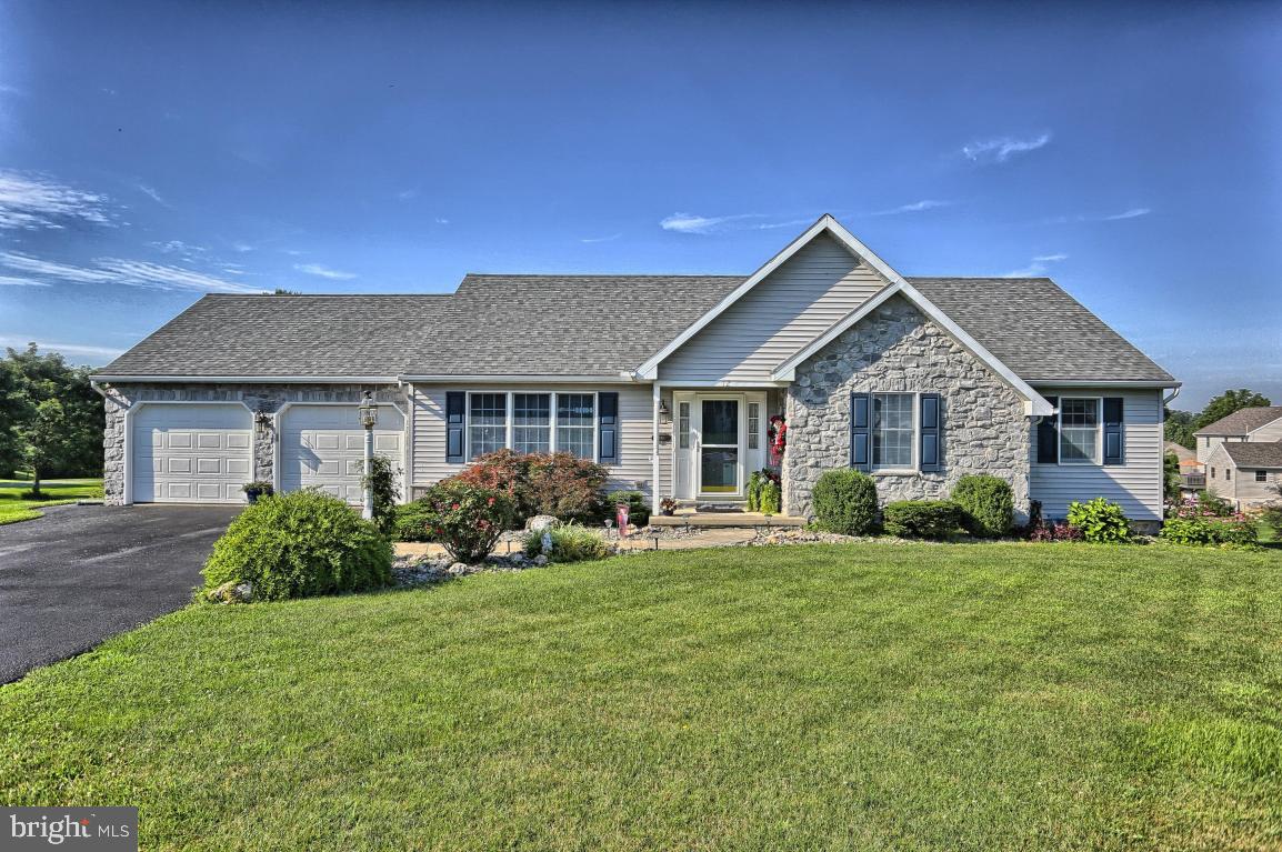 12 Sunset Lane Lititz, PA 17543 - Photo 1 of 34 a front view of a house with a yard