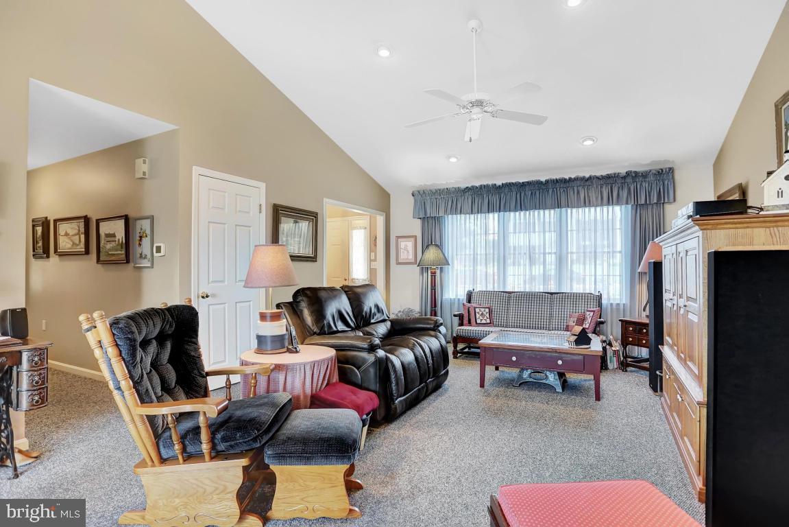 12 Sunset Lane Lititz, PA 17543 - Photo 11 of 34 a living room with furniture windows and a flat screen tv