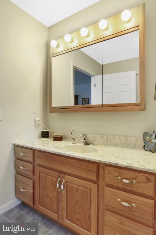 12 Sunset Lane Lititz, PA 17543 - Photo 18 of 34 a bathroom with a sink and a mirror
