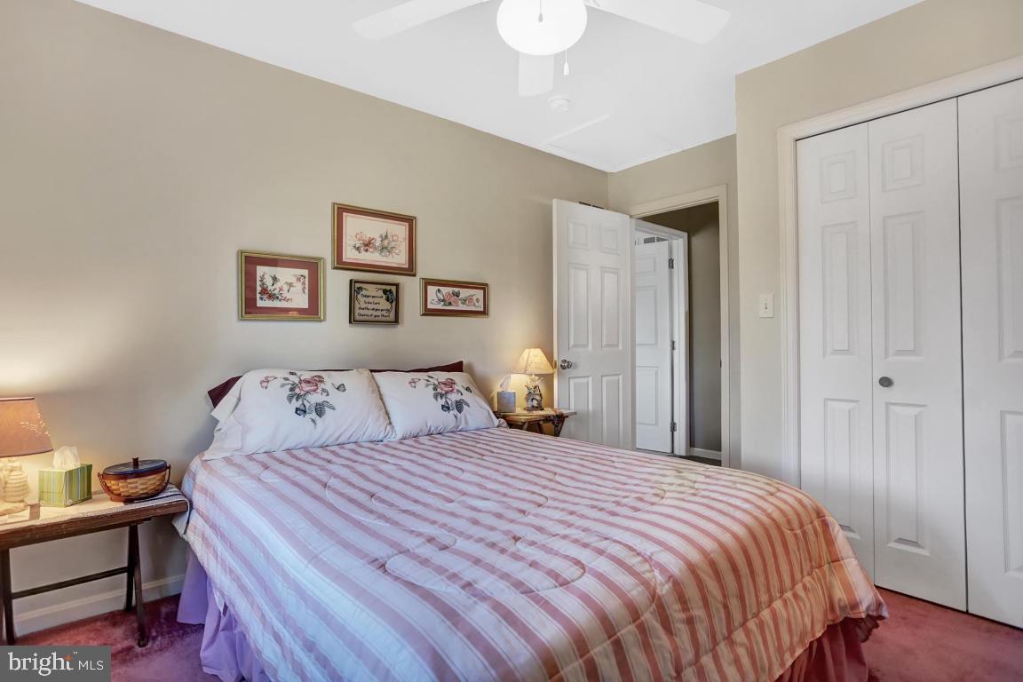 12 Sunset Lane Lititz, PA 17543 - Photo 20 of 34 a bedroom with a bed and a lamp