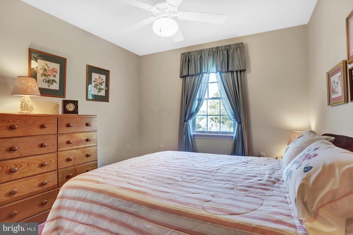 12 Sunset Lane Lititz, PA 17543 - Photo 21 of 34 a bedroom with a bed and a window
