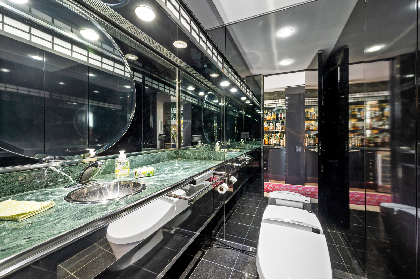 180 East Pearson Street, Unit 6907 Chicago, IL 60611 - Photo 17 of 44 a lobby with a couch and a rug