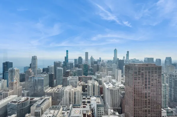 a view of a city with tall buildings in the background