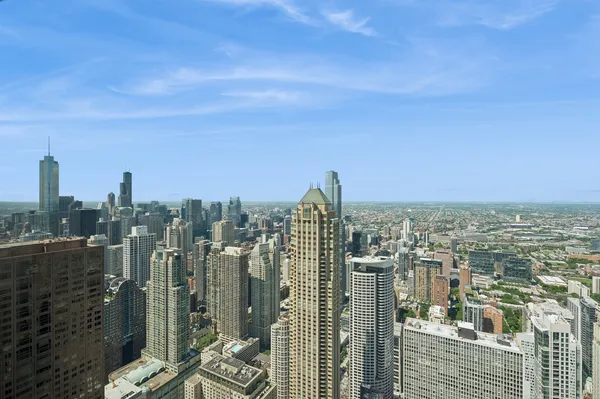 a view of a city with tall buildings