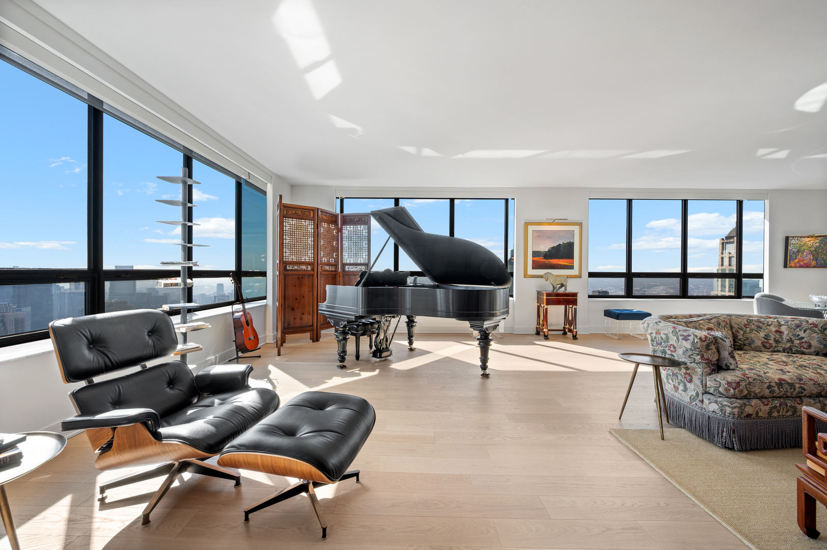 180 East Pearson Street, Unit 6907 Chicago, IL 60611 - Photo 8 of 44 a living room with furniture and a large window