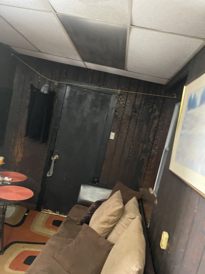 1013 West 63rd Street Chicago, IL 60621 - Photo 15 of 16 a bathroom with a sink and toilet
