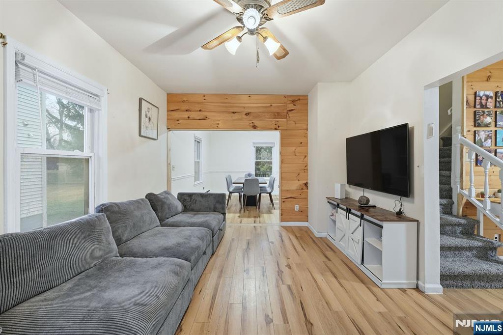 31 West Street Closter, NJ 07624 - Photo 2 of 18 a living room with furniture and a flat screen tv