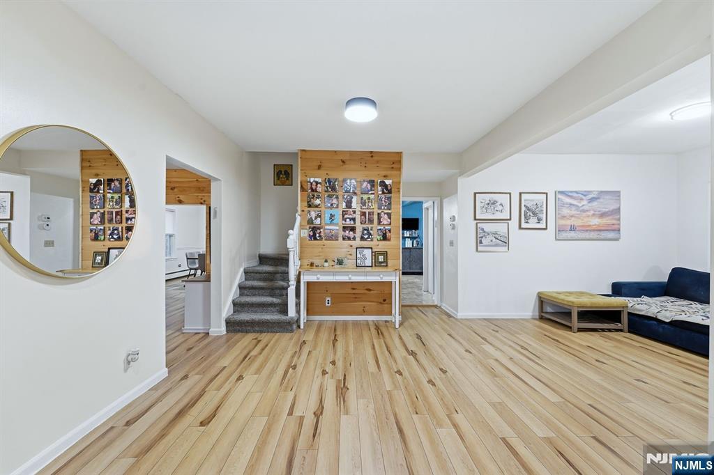 31 West Street Closter, NJ 07624 - Photo 3 of 18 a bedroom with furniture and wooden floor