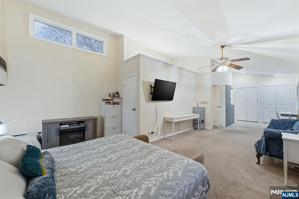 31 West Street Closter, NJ 07624 - Photo 10 of 18 a bedroom with a bed and a flat screen tv