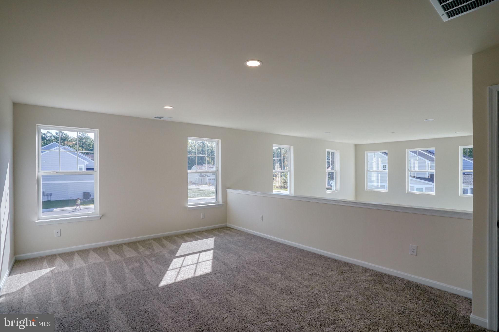 33908 Ardwell Road Frankford, DE 19945 - Photo 24 of 44 a view of empty room with windows