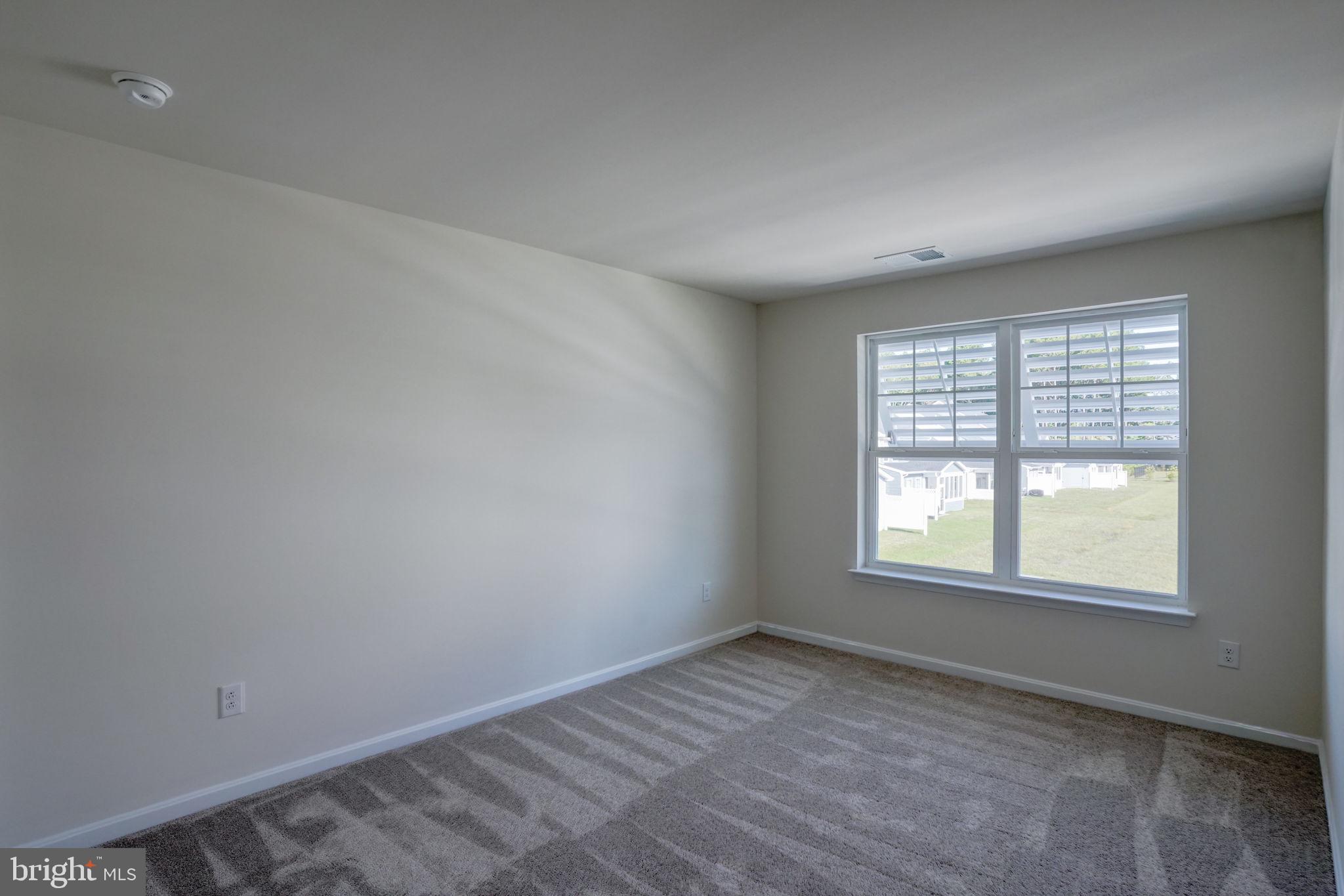 33908 Ardwell Road Frankford, DE 19945 - Photo 28 of 44 an empty room with a window