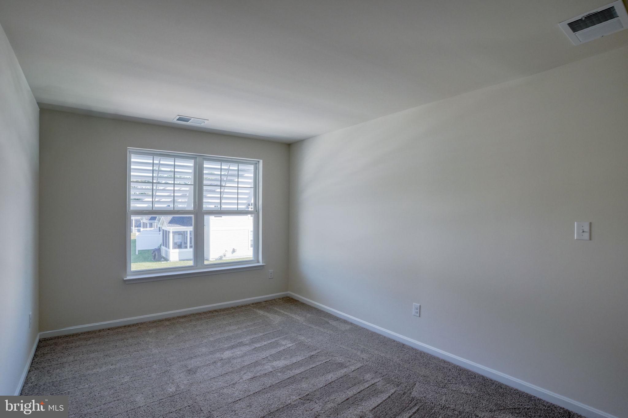 33908 Ardwell Road Frankford, DE 19945 - Photo 29 of 44 an empty room with a window