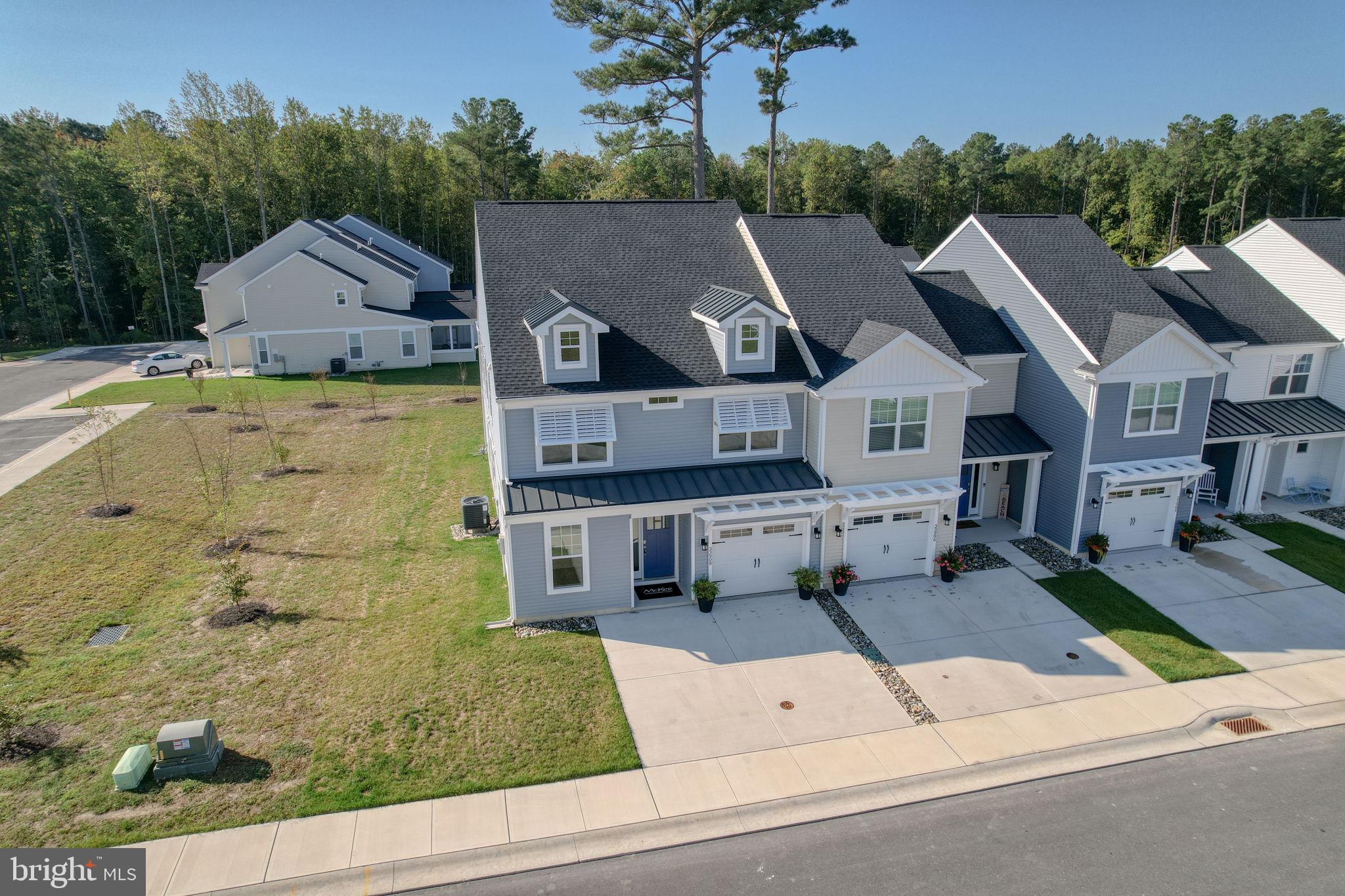 33908 Ardwell Road Frankford, DE 19945 - Photo 3 of 44 an aerial view of a house with a garden