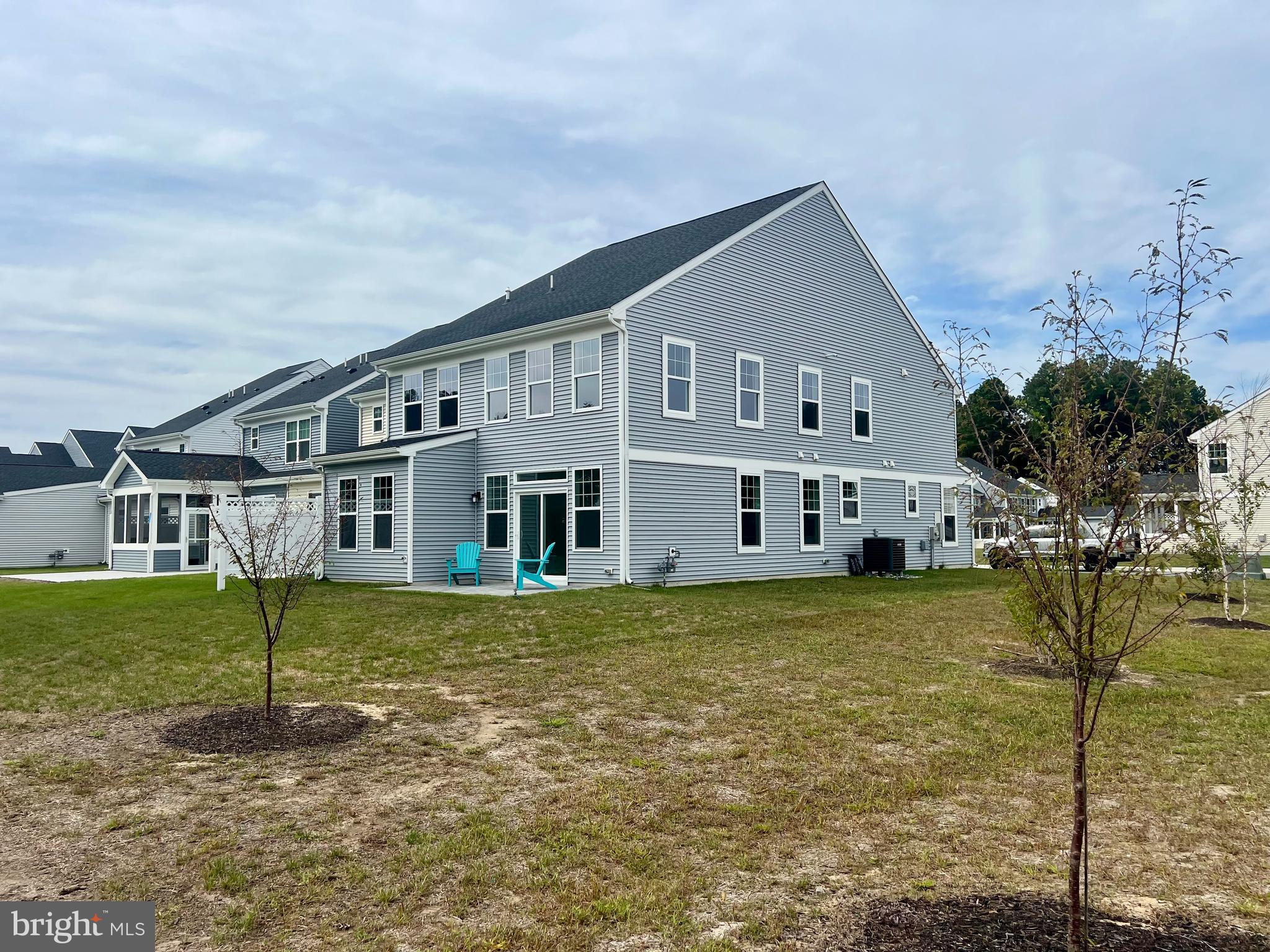 33908 Ardwell Road Frankford, DE 19945 - Photo 32 of 44 a house that has a big yard and large trees