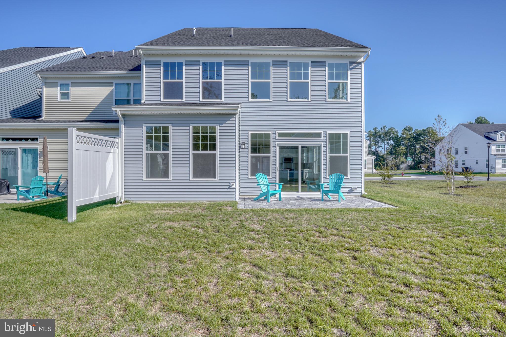 33908 Ardwell Road Frankford, DE 19945 - Photo 36 of 44 a view of a house with swimming pool and a yard