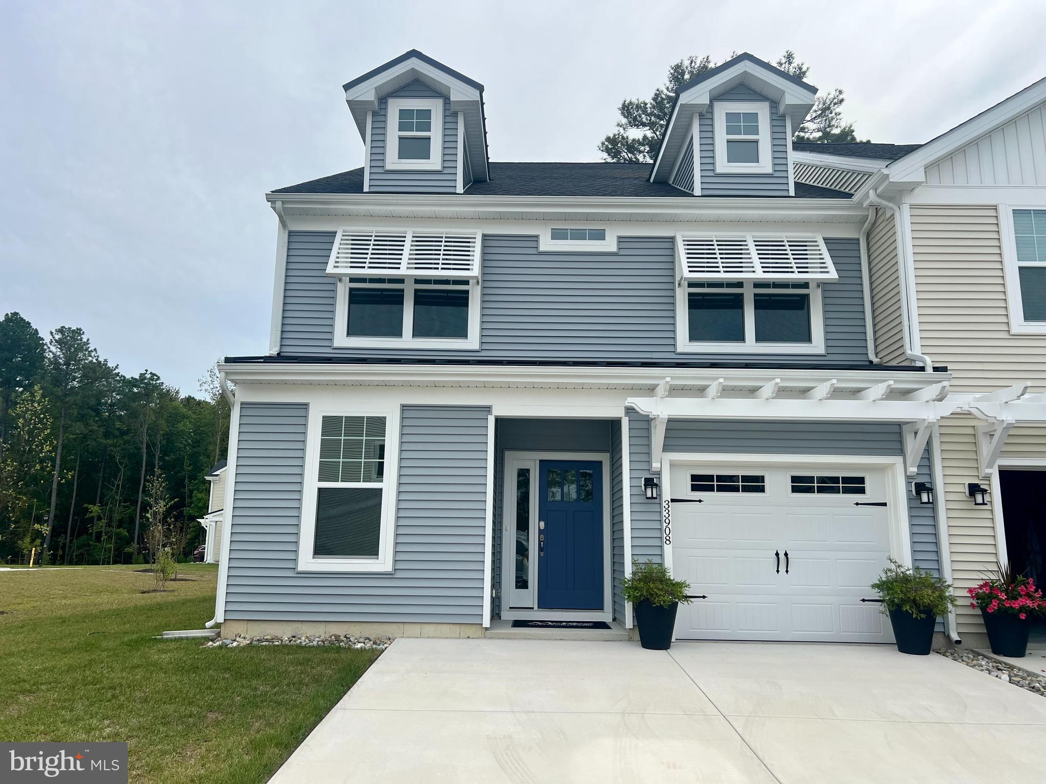 33908 Ardwell Road Frankford, DE 19945 - Photo 37 of 44 a front view of a house with a yard